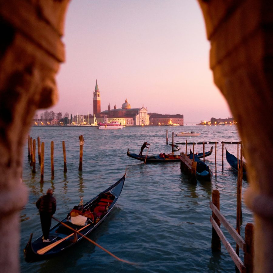 Gondolas moored in Venice at dusk